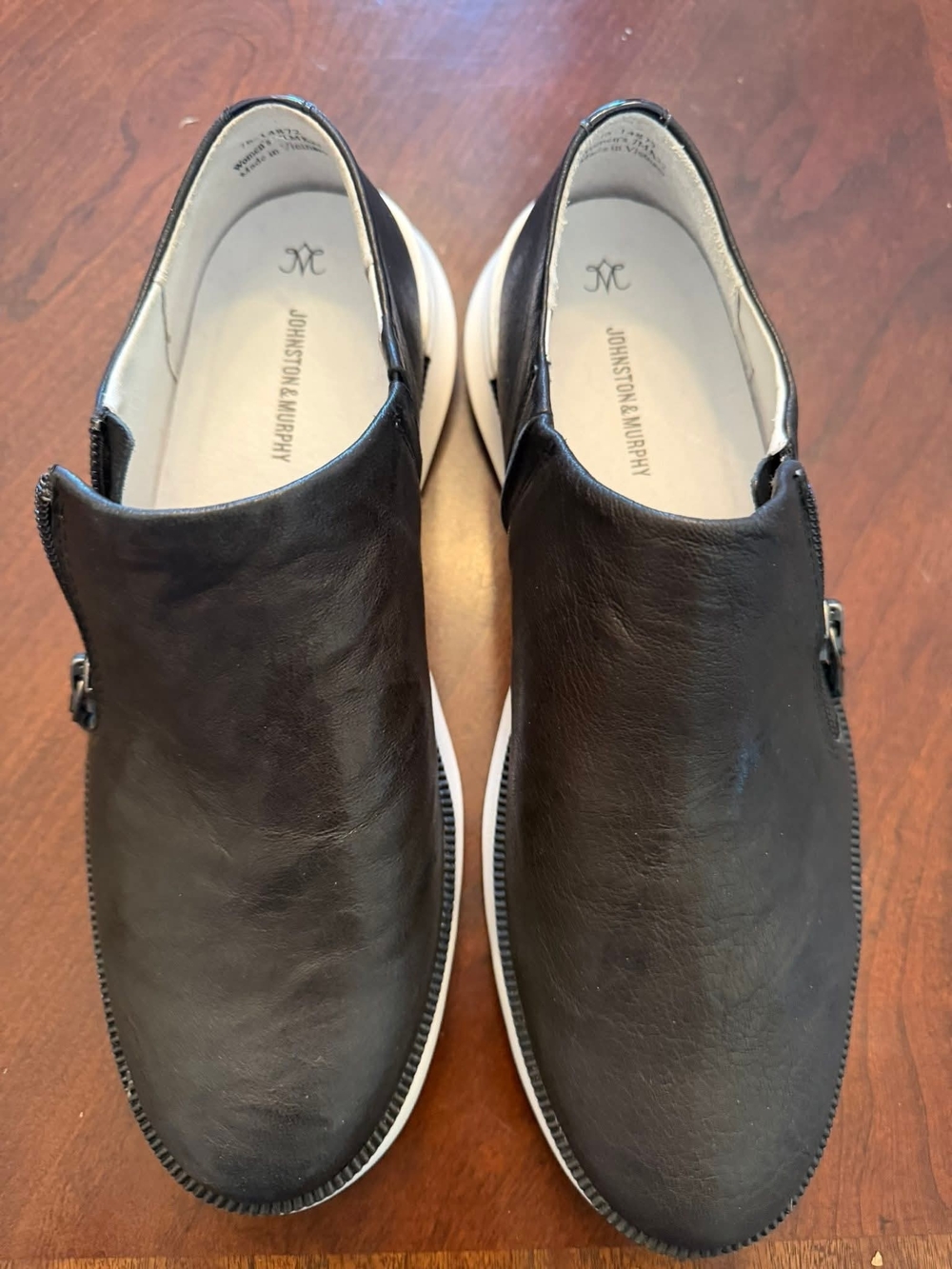 Johnston & Murphy Black Leather Slip-On Loafers with White Sole Accent